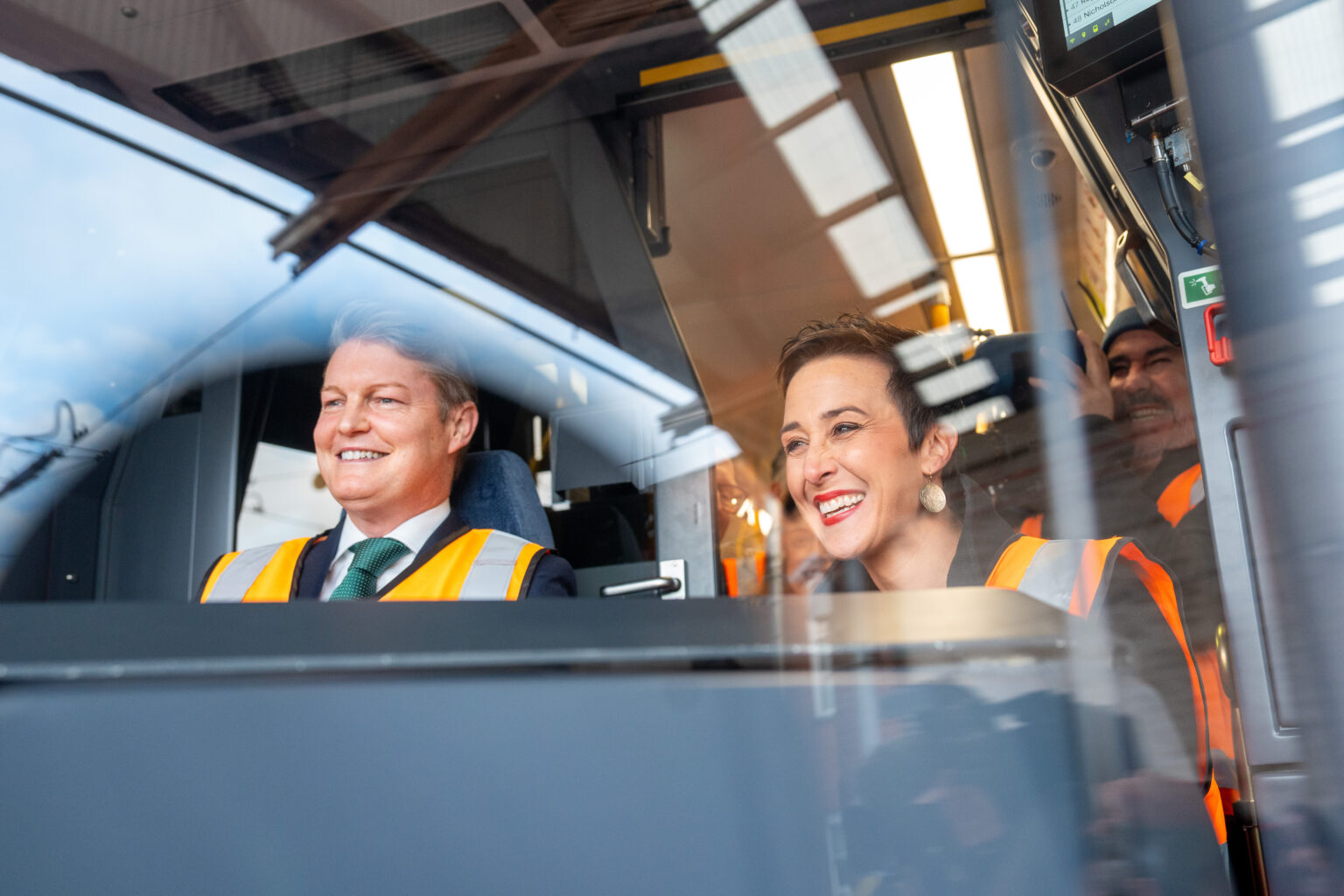 Gabrielle Williams in a new tram with Ben Carroll
