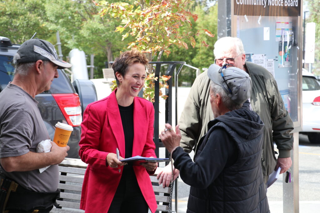 Gabrielle Williams laughing with local constituents